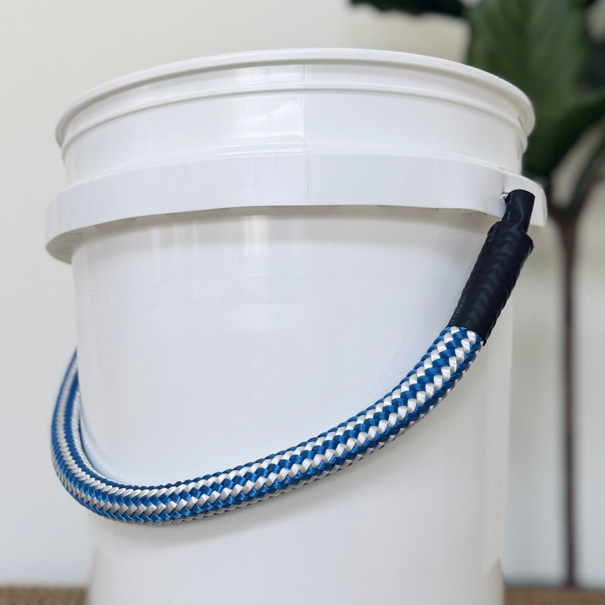 Cast & Carry striped rope handle installed on a white 5-gallon bucket
